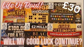 £30 mix of lotto scratch cards. How many of these 6 £5 scratch cards will be winners?