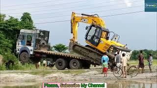 Experienced Excavator Operator Loading And Unloading Excavator