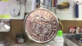 Silver £50 pound coin pendent