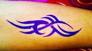 A simple Tribal tattoo on hand with pen ll Amazing tattoo designs