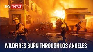 Two dead in Los Angeles wildfires - as blazes 'growing'