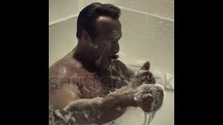 Arnold Schwarzenegger takes a bath