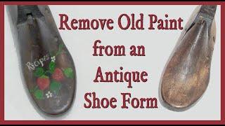 Remove old paint from an antique shoe form