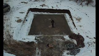 Digging a foundation and pouring a footing