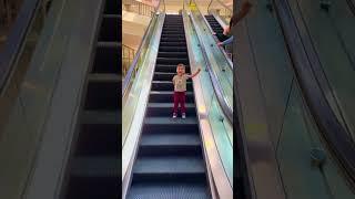 smart cute baby got tired and taking rest on #escalator