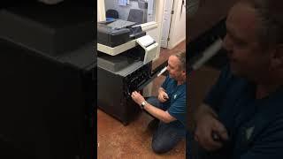 Paper tray removal Konica photocopier