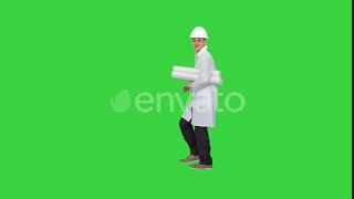 Engineer Holding a Blueprint for His Work Walking By on a Green Screen, Chroma Key | Stock Foota...