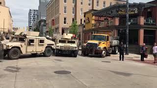 Michigan National Guard Humvees line street in downtown Grand Rapids