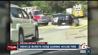 Indianapolis Fire Department wants to know who ran over one of their hoses at a fire scene