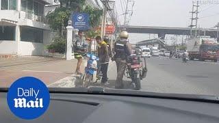 Thai police make teens do push-ups instead of paying a fine