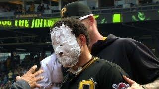 Players from around the league celebrate with pie