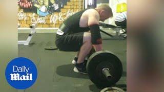 Man is almost crushed by heavy barbell in epic gym fail - Daily Mail