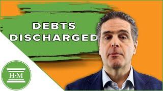 What debts are discharged by bankruptcy in Canada?