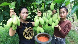 Eating green mango with chili sauce with my sister delicious