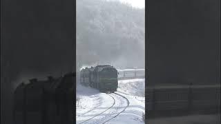 Winter sunny day and coal fired fast train