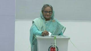 Bangladesh PM Hasina votes in election without opposition | AFP