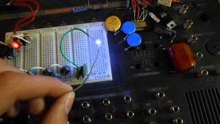 high voltage multiplier with different output capacitors