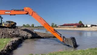 AMAZING Long Reach Doosan Excavator at work!