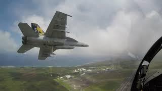 F/A-18E Super Hornets perform carrier break over Iwo Jima