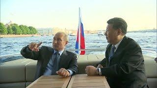 Путин и Си Цзиньпин совершили водную прогулку по Петербургу