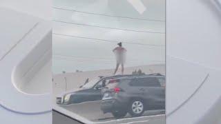 Naked woman jumps onto her car on Torrance freeway after police chase