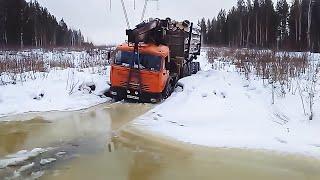 Тяжелые внедорожники КАМАЗ зимой пересекают северную 