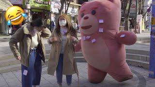 Person Vs Giant bear Plays Post-It Note Game 