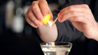 How to Flame an Orange Peel - DrinkSkool Bar Techniques