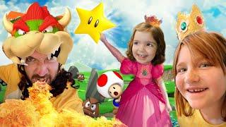 Adley & Navey vs BOWSER DAD!!  Mini game battle for stars at Clair's Real Life Mario Party Birthday!