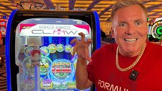 Trying To Win $10,000 On The Casino Claw Game!