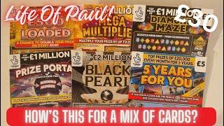 £30 mix of lotto scratch cards. How many of these 6 £5 scratch cards will be winners?