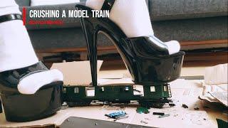 Schoolgirl crushes model train #heels #crush #shoes #asmr