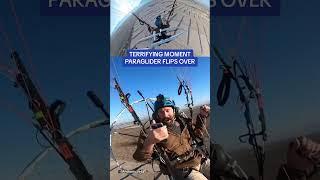 Terrifying moment paraglider falls out of the sky