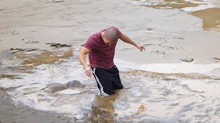 Man WALKING and STUCKING in quicksand