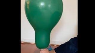 Inflating a Green Qualatex 24 inch balloon