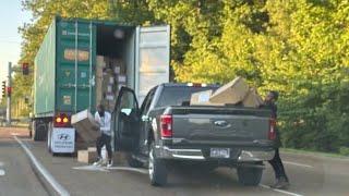 Thieves rob truck at red light in front of Nike logistics center