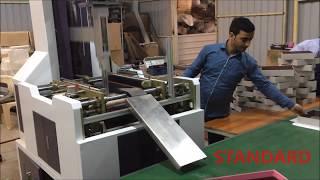 Rigid box making machine