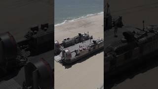 SHORE SURPRISE! Navy combat boat pulls up to VA Beach shore fully loaded!! #NavyPower #CombatBoat