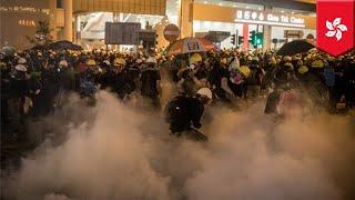 Hong Kong Protests: Police fire tear gas into metro station - TomoNews