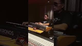 Scott Storch   in the studio with his son cooking something