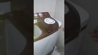 How to remove cloth stuck below washing machine spinner drum