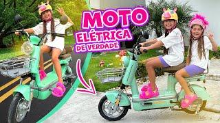 24 horas COMPRANDO uma MOTO ELETRICA de verdade para a Laurinha