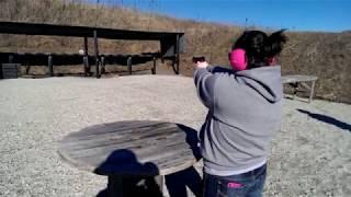 My Wife shooting her .22 at the steel plates