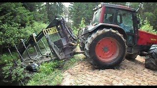 Valtra forestry tractor turns around on the narrow road