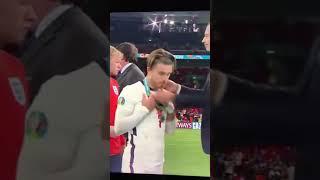 England team takes off medals after getting handed them in euro finals