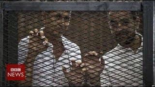 Why did Egypt jail Al Jazeera's journalists? In 60 seconds - BBC News