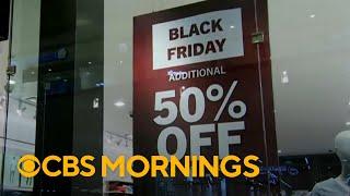 Black Friday shoppers flock to stores for holiday deals