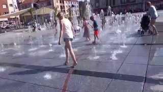 Koszalin (Poland): kids playing at the fountain, making fun