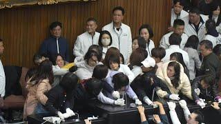 Taiwan lawmakers brawl over bills that could 'damage democracy' | AFP