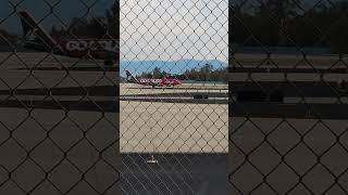 Alaska Airlines "Go Cougs"Aircraft Embraer E-175 getting ready for takeoff